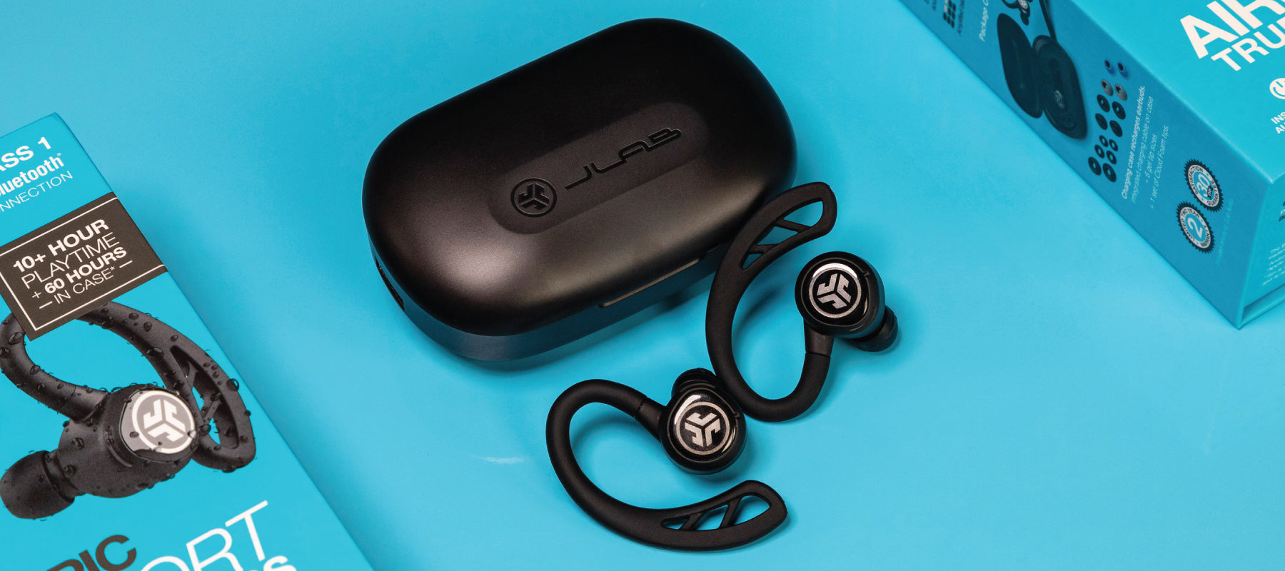 Epic Air Sport earbuds next to case